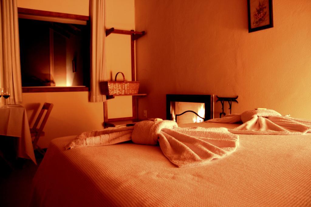 Pousada Gaya Carrancas Bagian luar foto